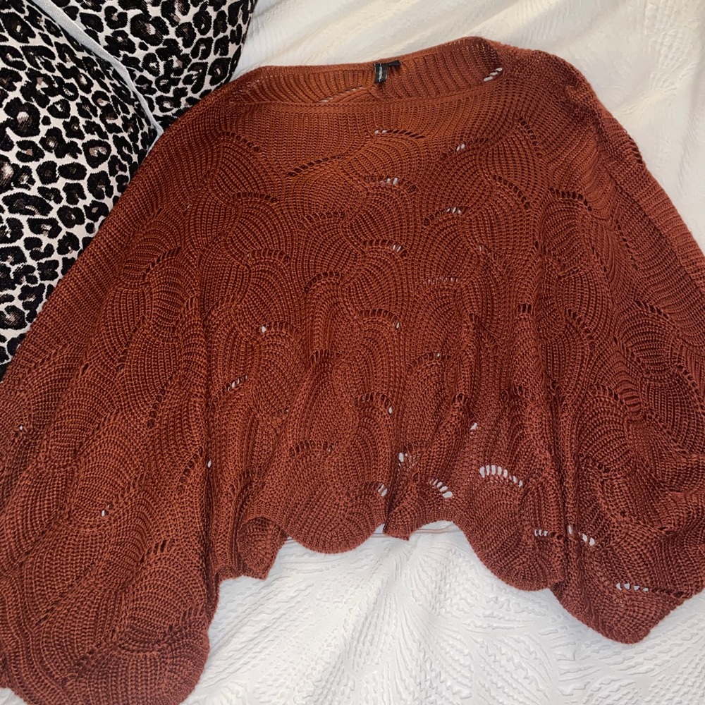 Burnt orange colored knit sweatshirt